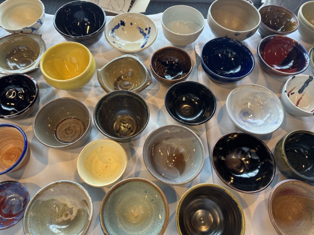 Table full of colorful bowls