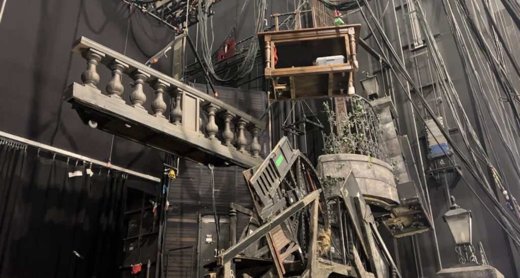 Sets hung from the ceiling back stage for Les Misérables. 