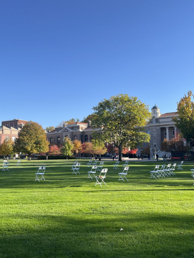 Chairs meant to honor the 35 SU students who passed away on Pan Am Flight 103 sit on SU's Shaw Quadrangle.