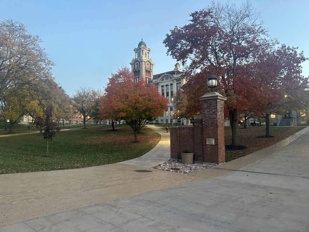 Blue skies and Autumn leaves surround Syracuse University's Campus
