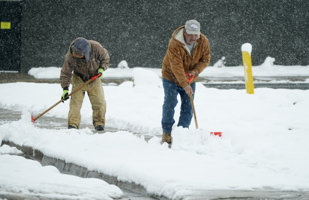 People shoveling snow.