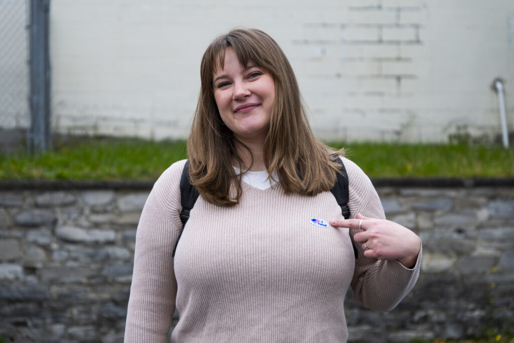 young voter with sticker