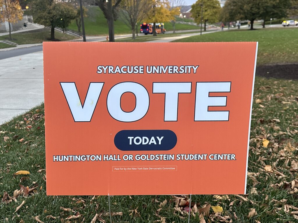 Syracuse University has placed signs across campus to promote voting and the locations where students can vote. 