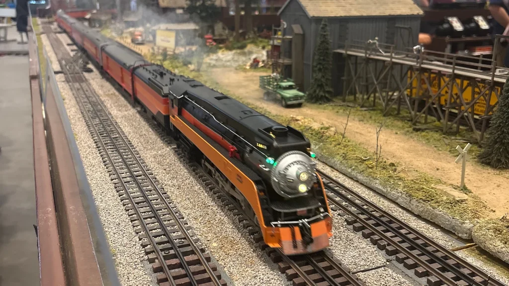 A model train blowing steam