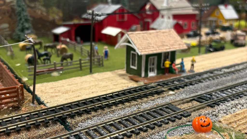 A miniature farm set built for a model train set.