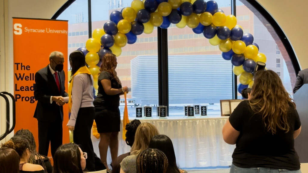 WellsLink Scholar receives her award after her name is called.