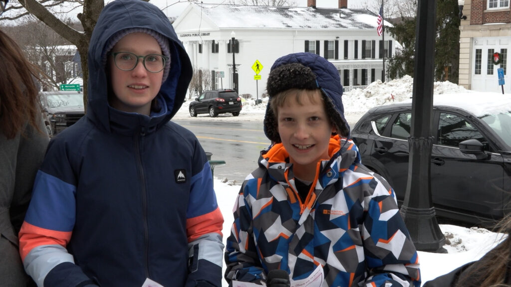 Betsy and Teddy Sympson share what they found while completing the story stroll. 