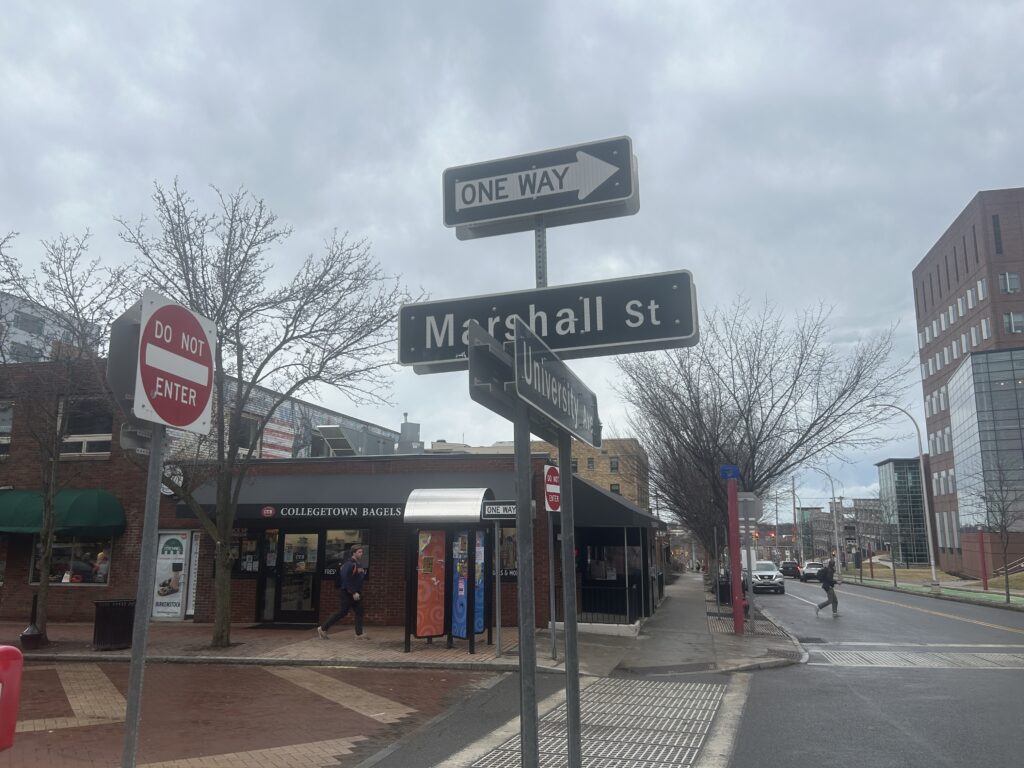 Marshall Street road sign in the middle of an intersection.