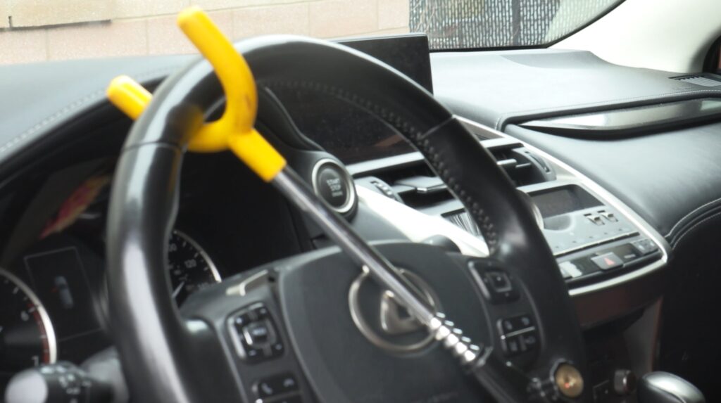 A steering wheel lock is used to provide extra protection for people to keep their car safe.