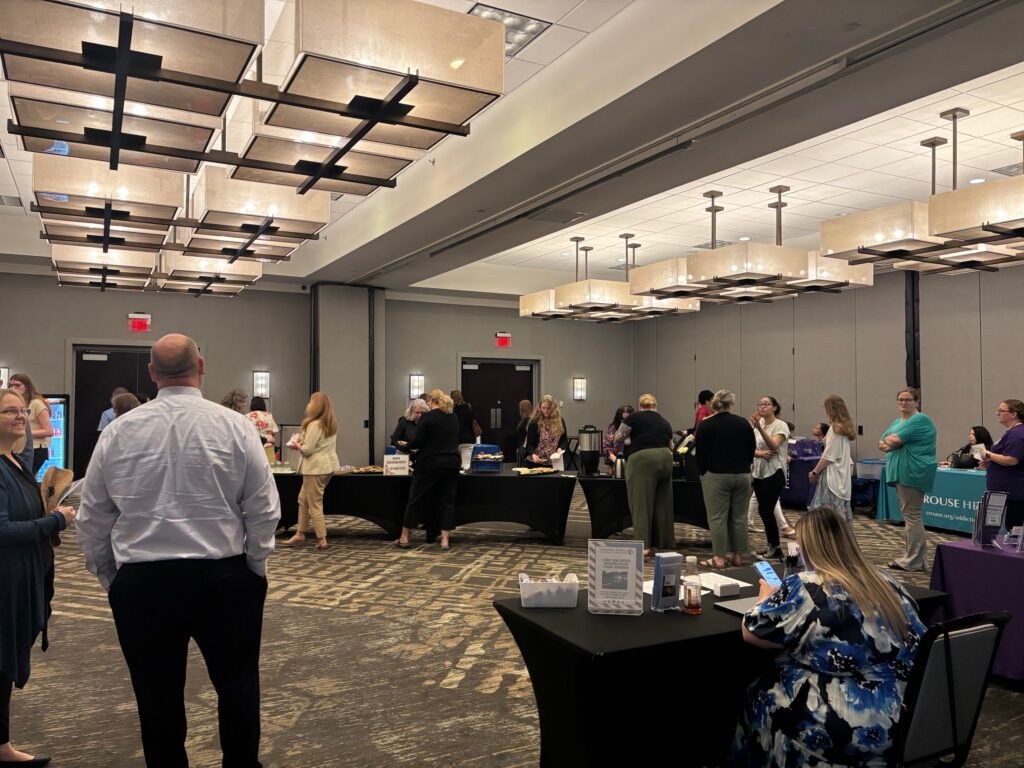 People lining up to get some refreshments during the break session 