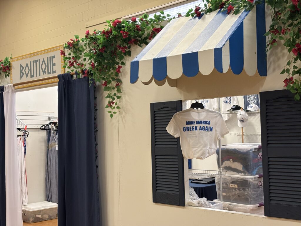 "Make America Greek Again" shirts, blending humor and pride in Greek heritage during the Saint Sophia’s Greek Cultural Festival.