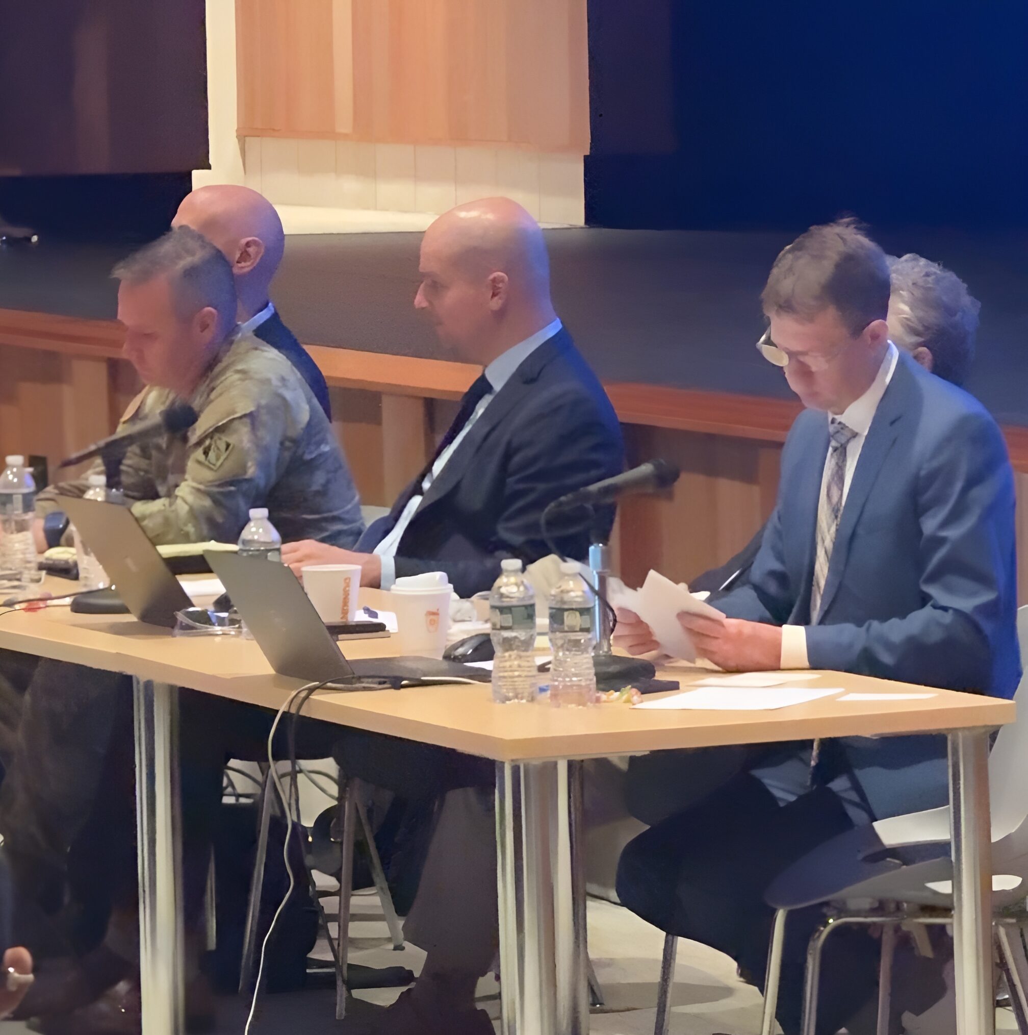 Officials listen to mixed reactions from locals on Micron's Draft Environmental Impact Statement during public hearings at Liverpool High School on July 24, 2025. 