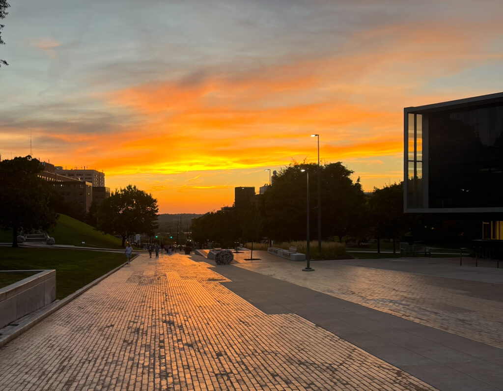 Sunset looking towards I-81 on Syracuse University's Einhorn Family Walk. 