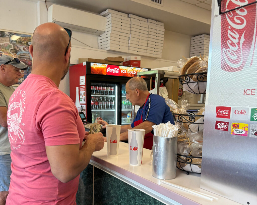Mario working behind the counter.