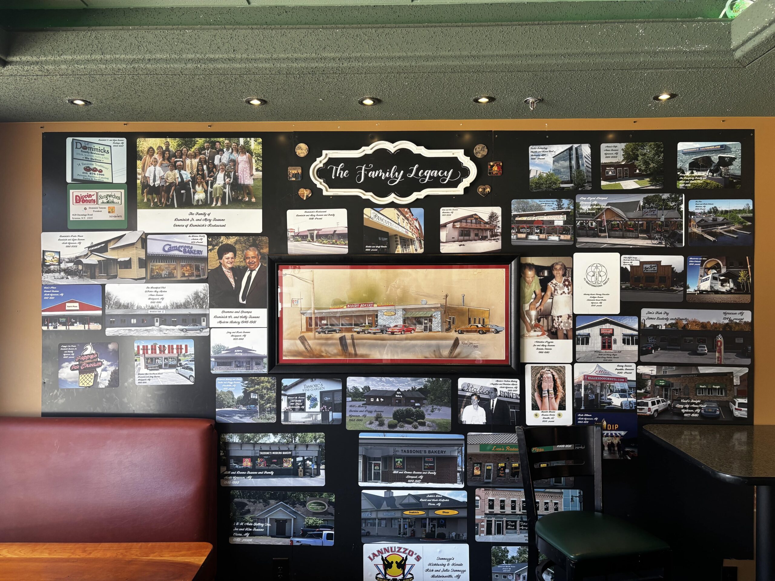 The Tassone family wall with various photos and holiday cards