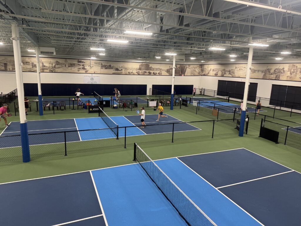Current image: Arial shot of Erie Canal Pickleball Center