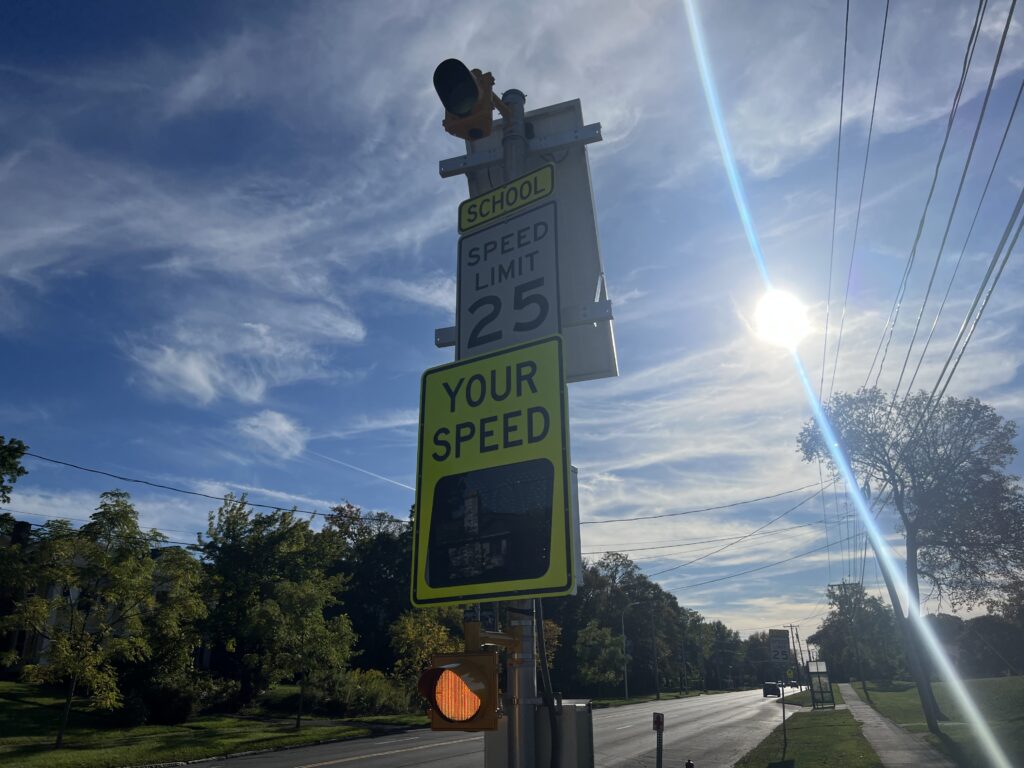Syracuse school zone camera with speed sign