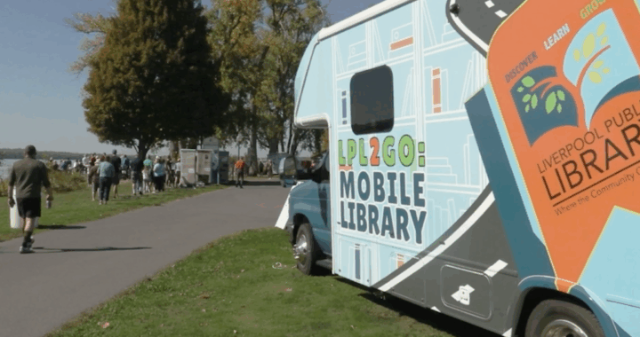 Liverpool Mobile Library van parked outside on a sunny day.