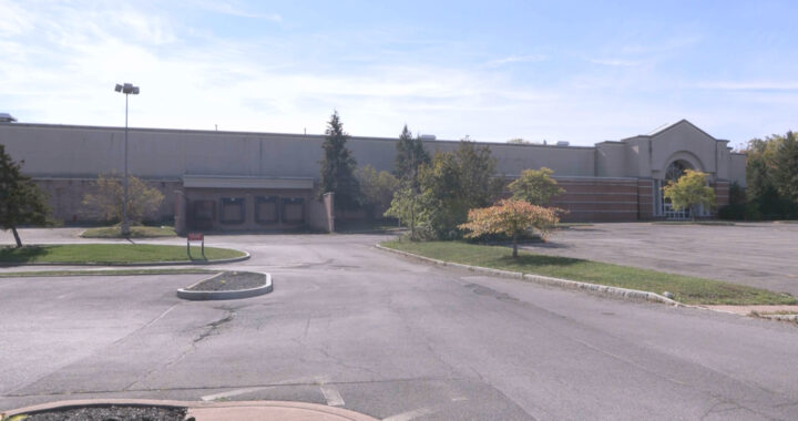 This image shows the abandonded Sears building in former ShoppingTown Mall.