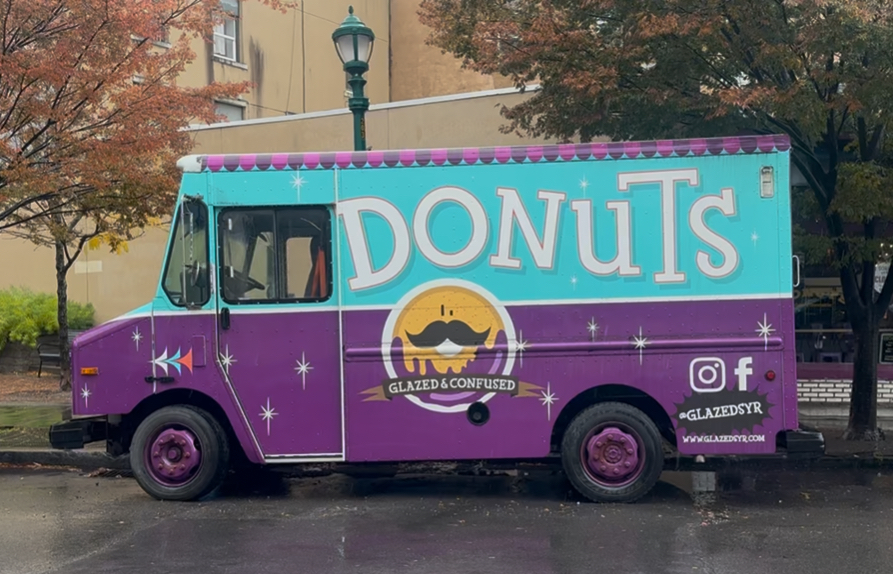 Glazed and Confused Donut Truck curbside of the shop