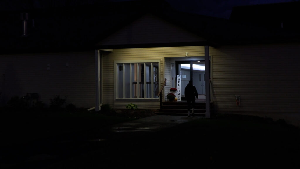 Very dark voting site where Danielle Dawley walks in.