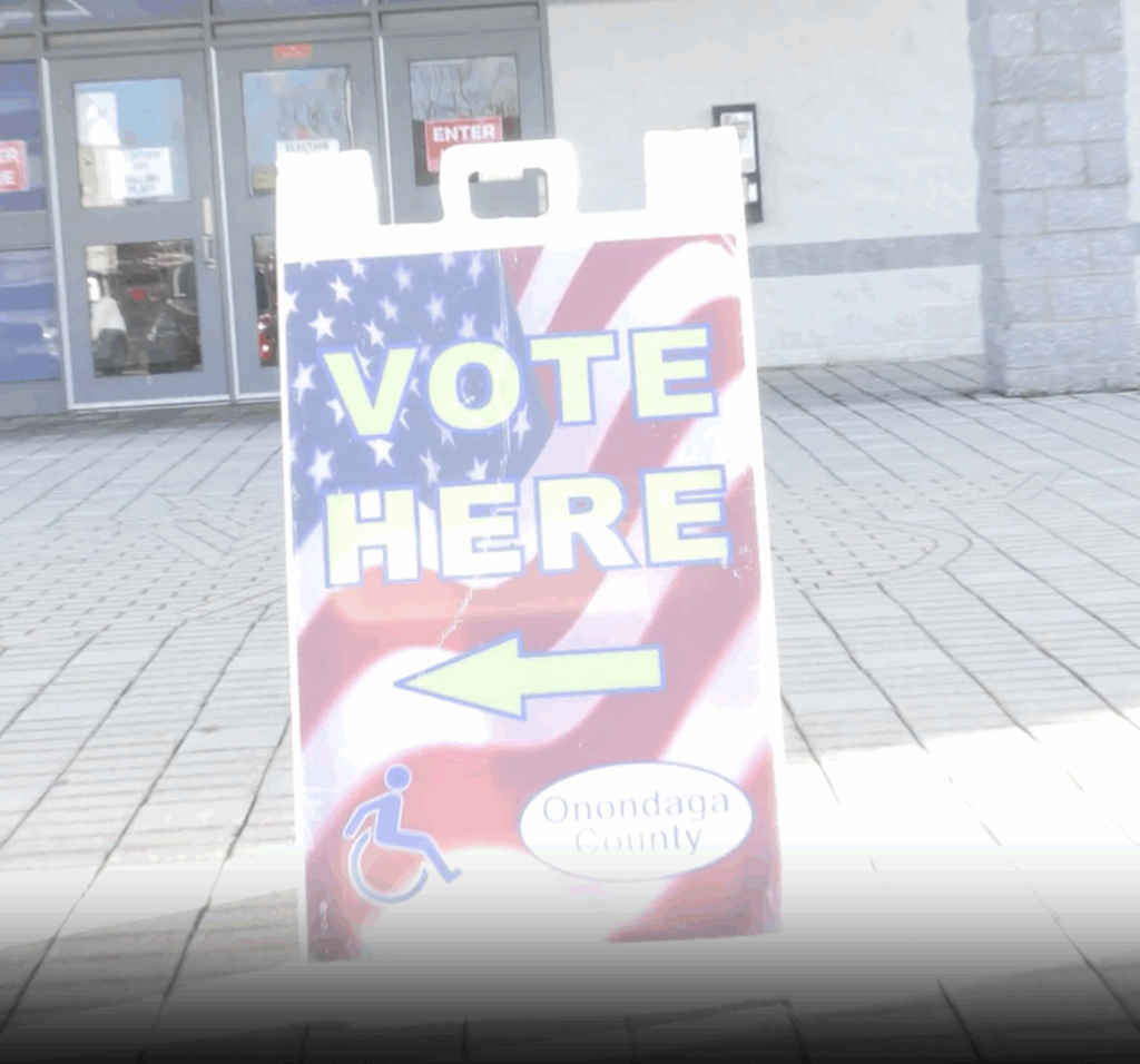 “Signs outside Cicero polling places guide voters on Election Day.”
