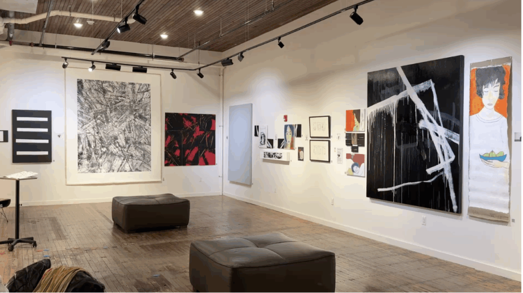 A wide image of art haus SYR and its "Love Story" exhibit featuring work by Jeff Gordon and Path Soong.
