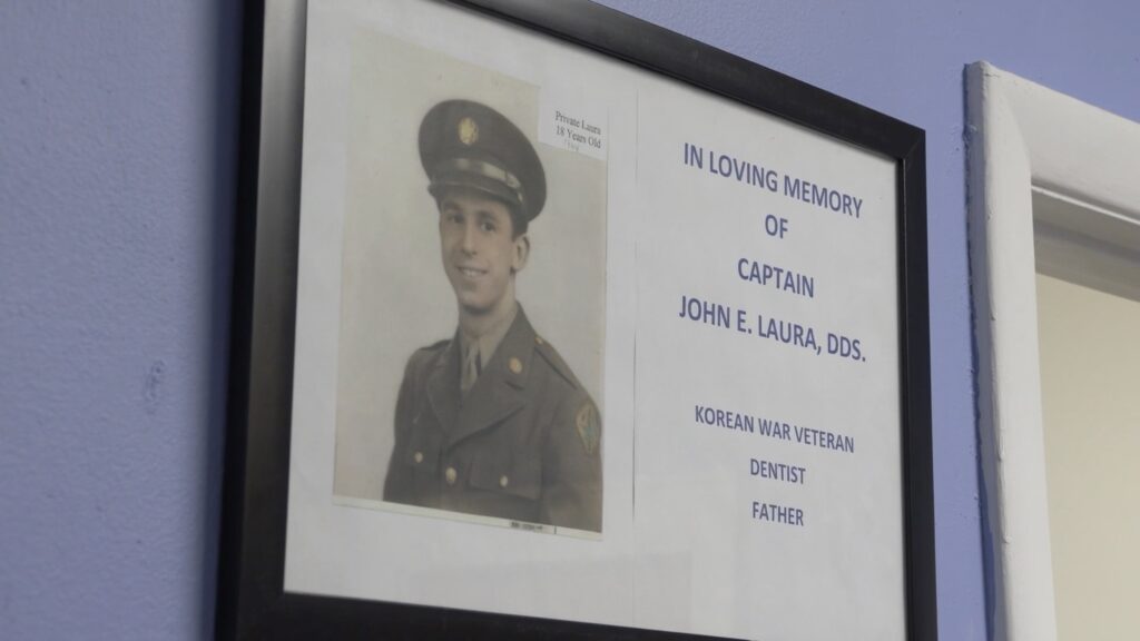 Captain John Laura's plaque at the Eastwood Dental Office.