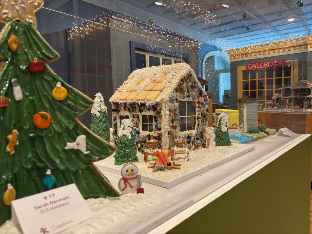 Festive gingerbread houses line the walls of the Erie Canal Museum's Gingerbread Gallery. 
