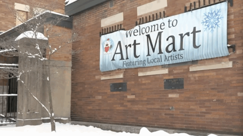 An image of the sign outside of Syracuse Art Mart.