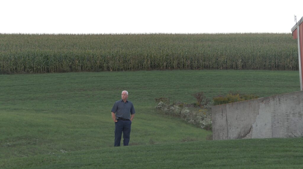 Fouts Farm owner Paul Fouts looks out on his farm