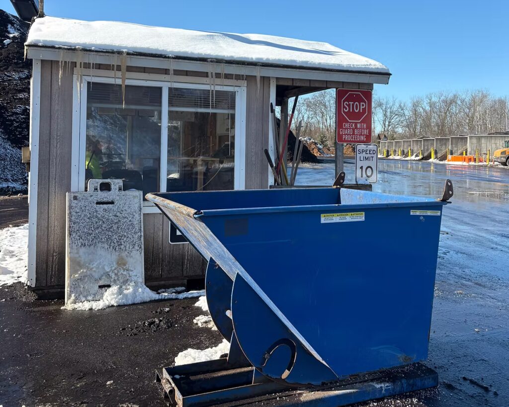 Residents can drop off their food waste in this blue bin at the Amboy Compost Site. Photo by Janice Ha