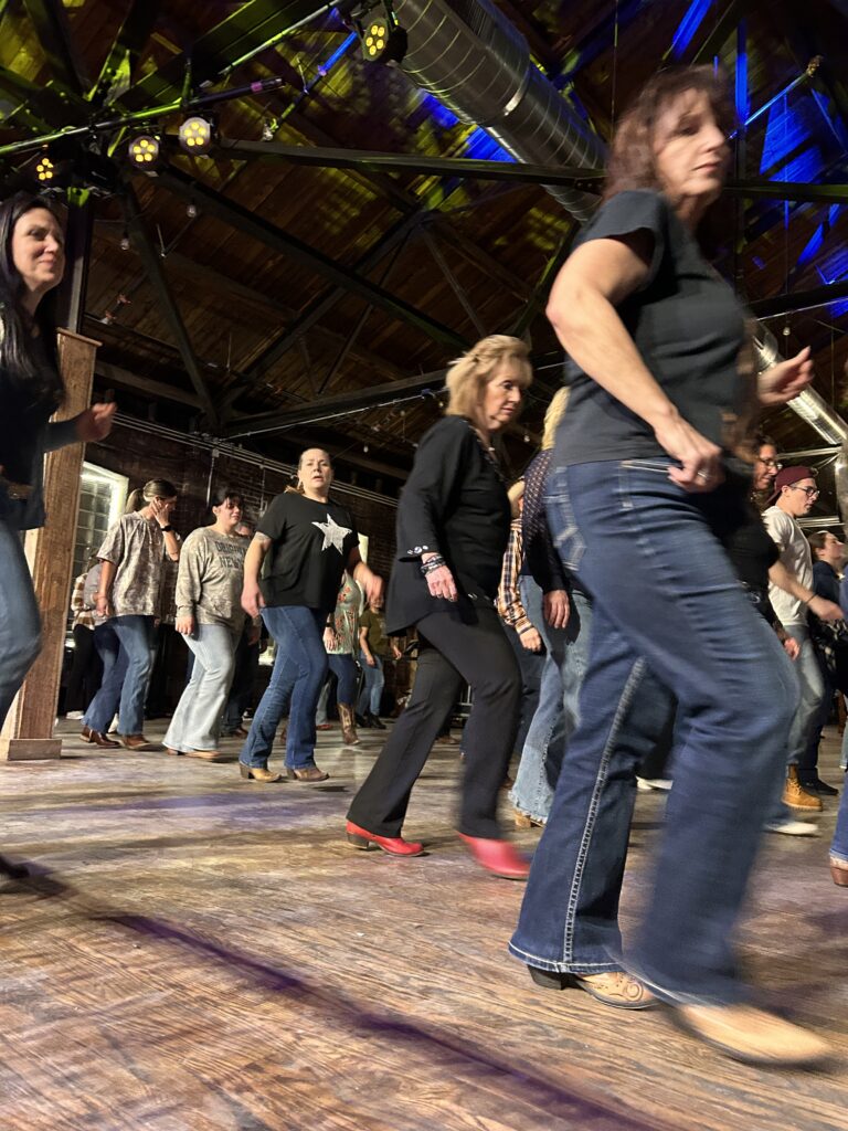 Boots at the Brewery— people fill the dance floor ready to stomp their boots.