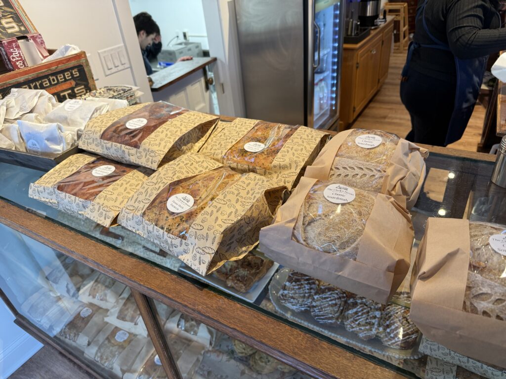 Newly packed bread rwaiting to be sold in the display case.
