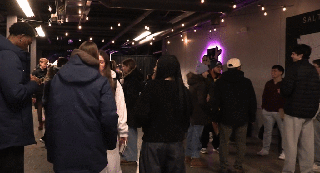 A group of young churchgoers are talking at The Salt Company worship on Thursday night. ©Leah Masi, 2026