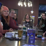 Syracuse book club brings community together over literature and libations