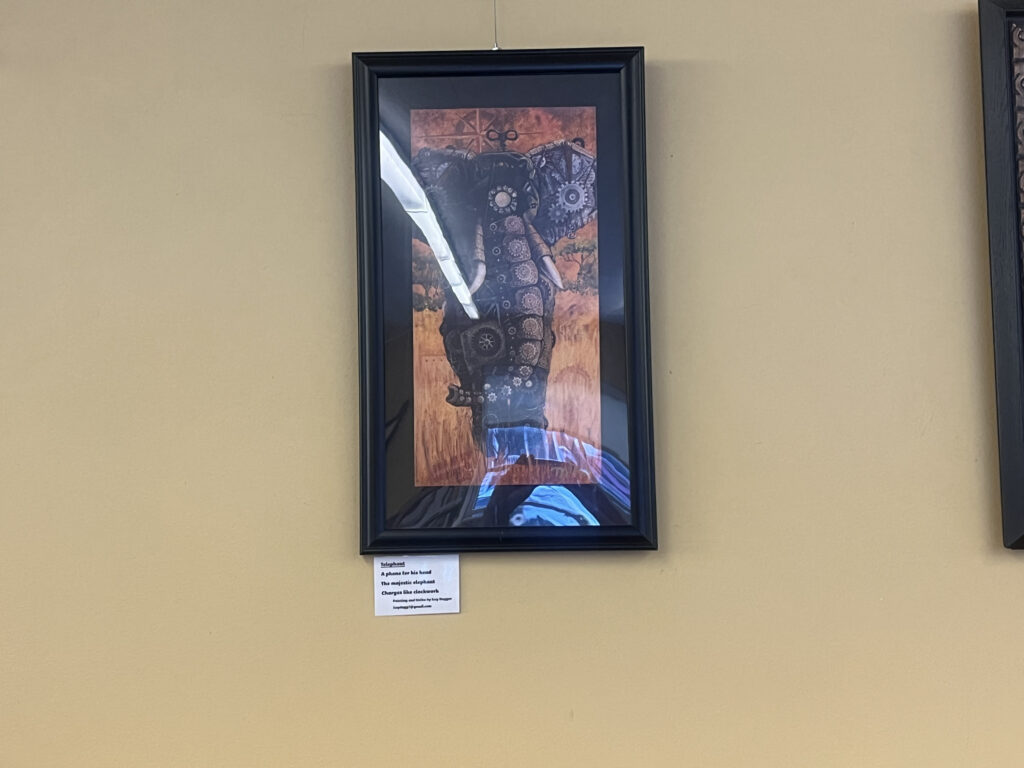 Black frame and picture is "Telephant" -Dugger's favorite piece in the collection.