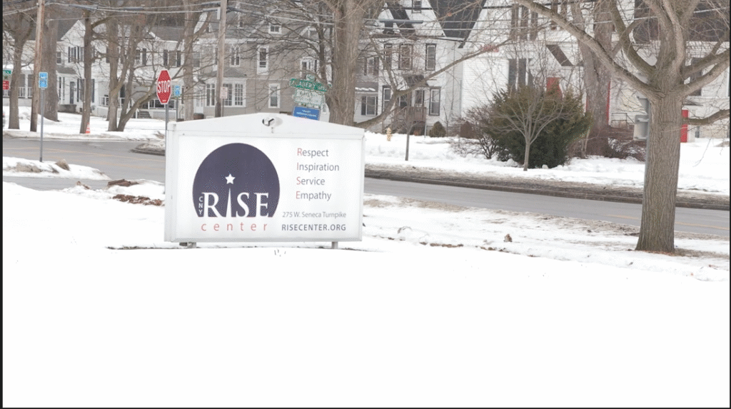 A sign outside CNY Rise Center in Syracuse
