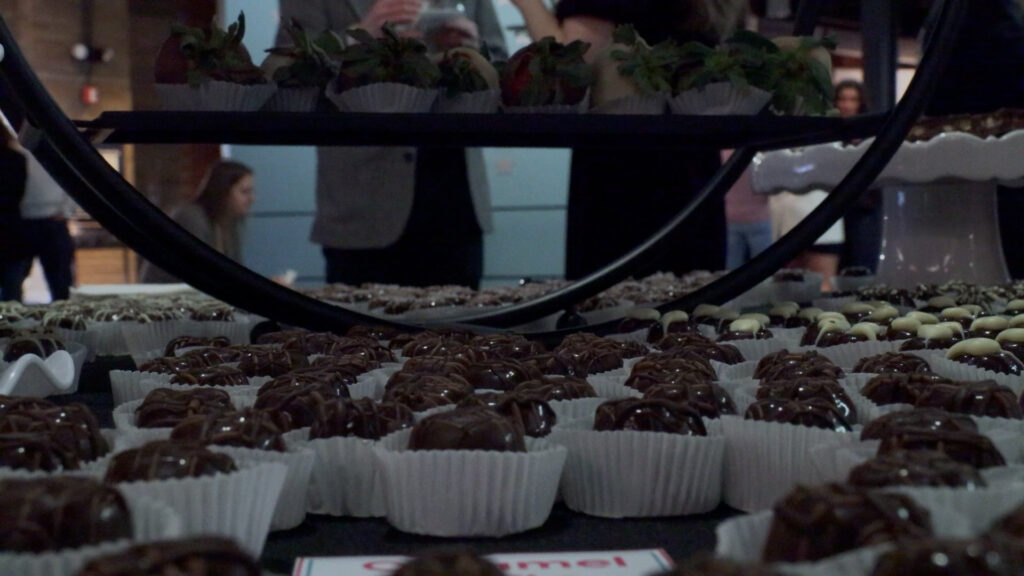 Chocolate truffles supplied by Sweet on Chocolate laid out on a table