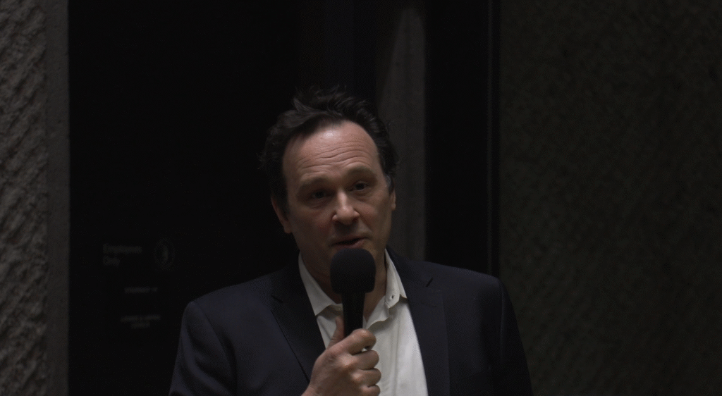 Solmi addressed the crowd during the exhibit's unveiling