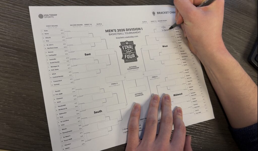 Student filling out their bracket. © Joey Cicini. 2026