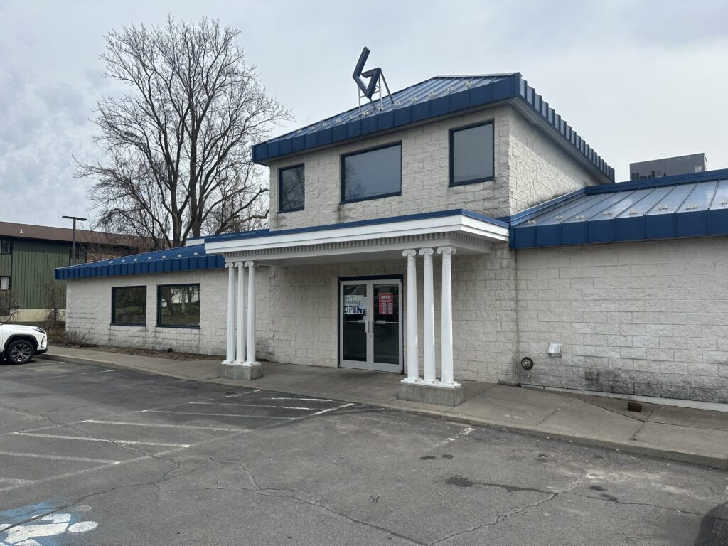 The front of Geddes Bakery with it's large Greek style "G" on top and faux white columns