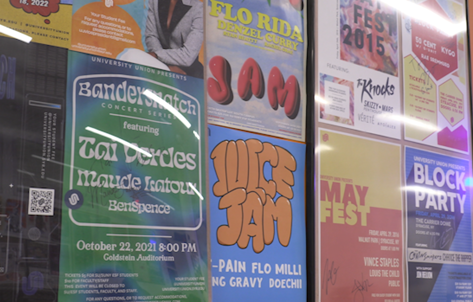 A wall of posters for Juice Jam, Block Party, and other music events in an array of colors.