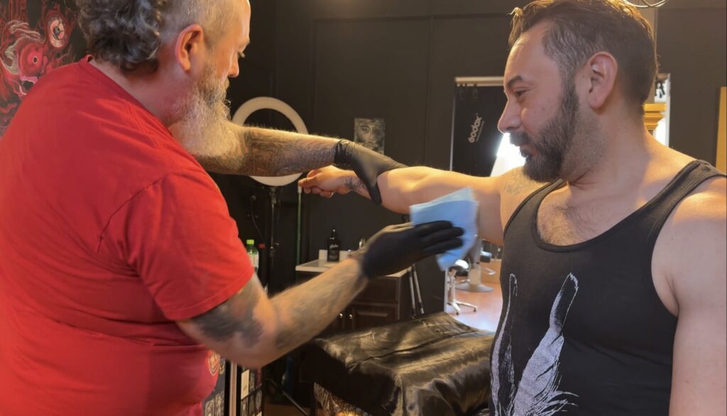 Crandall prepares arm.