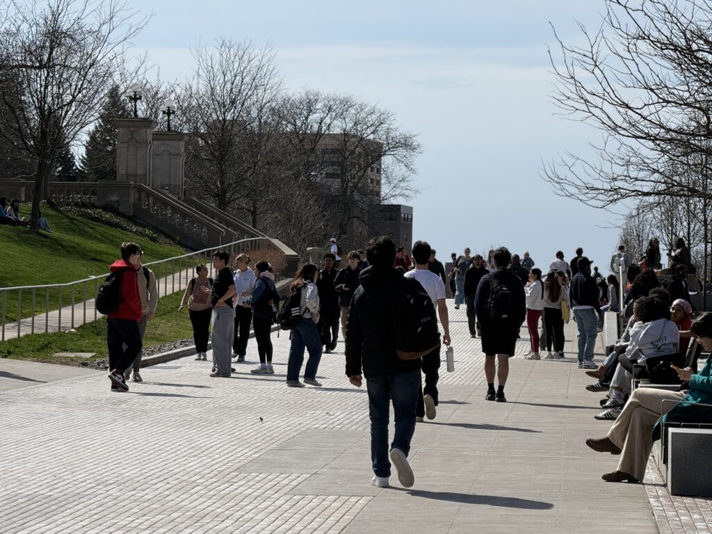 High schoolers taking a walk down the quad.