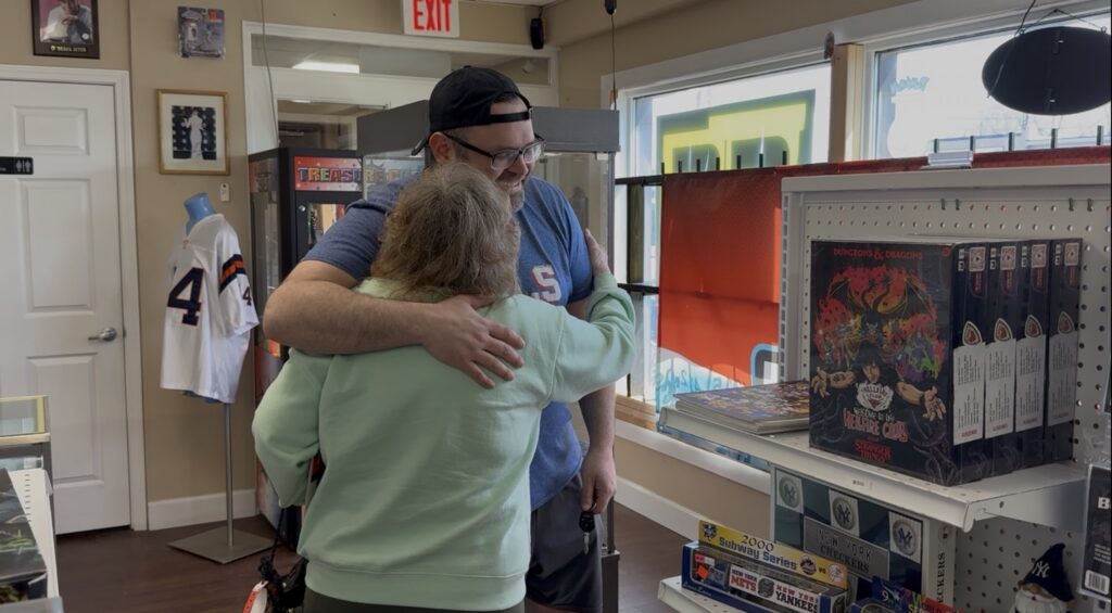 Owner Josh Gideon embracing customer and friend Yvonne Liblanc. © Joey Cicini. 2026 