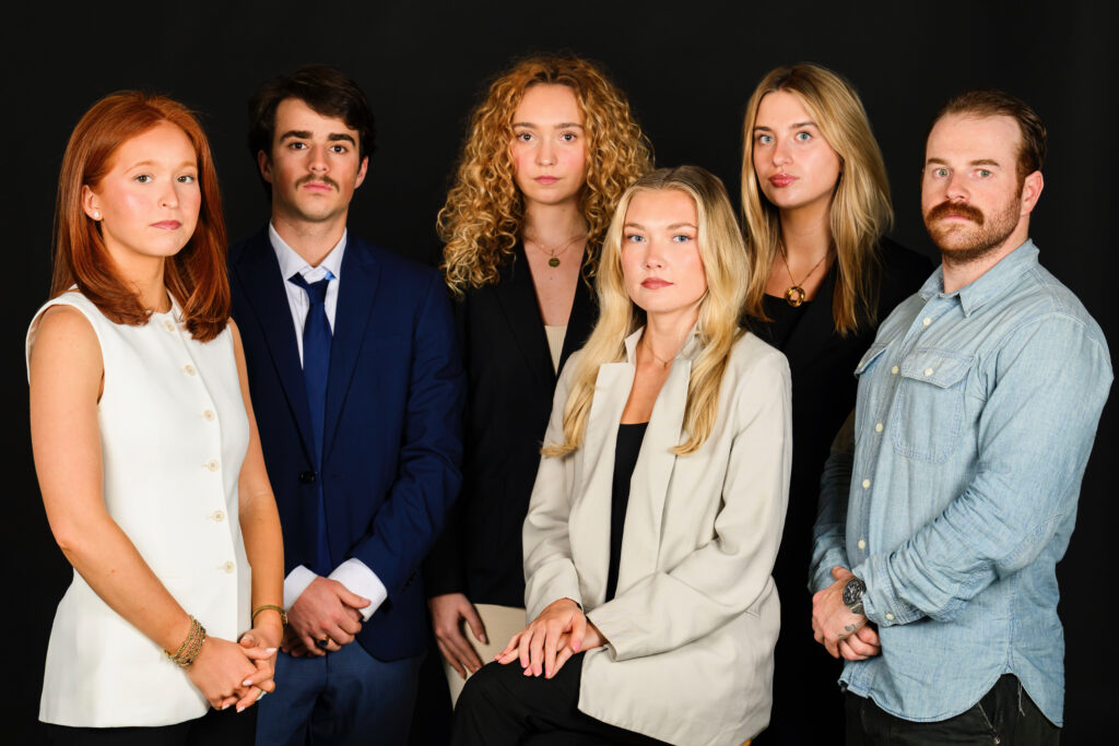The Newhouse Spotlight team poses for a photo. 