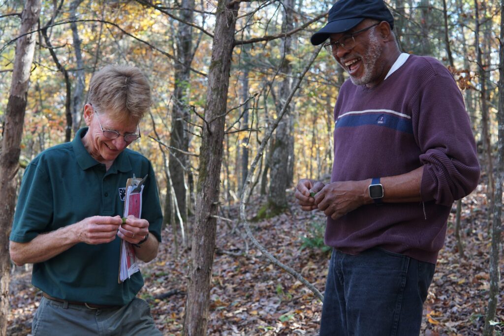The center's forester, David Bourgeois, with landowner Paul Brewer.(James Williams)