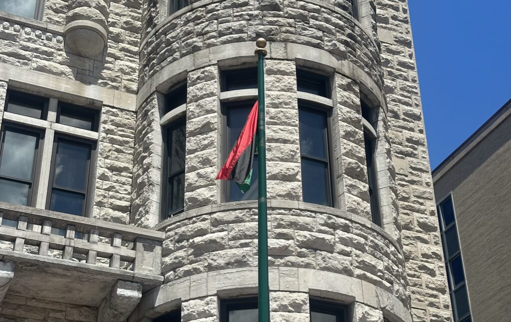 The Juneteenth flag flies outside of Syracuse City Hall.