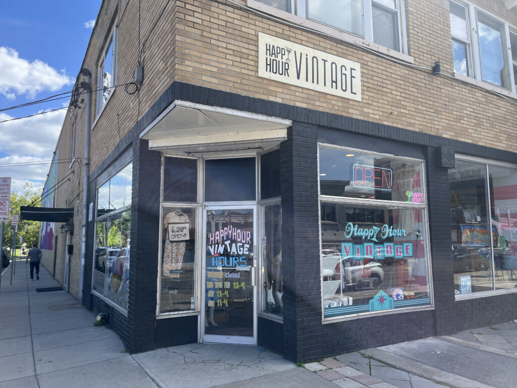 Happy Hour Vintage's building sits on the corner of James Street and Stafford Avenue. It's also next to the historic Palace Theatre.